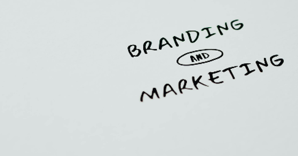 Branding and Marketing Text on a White Surface