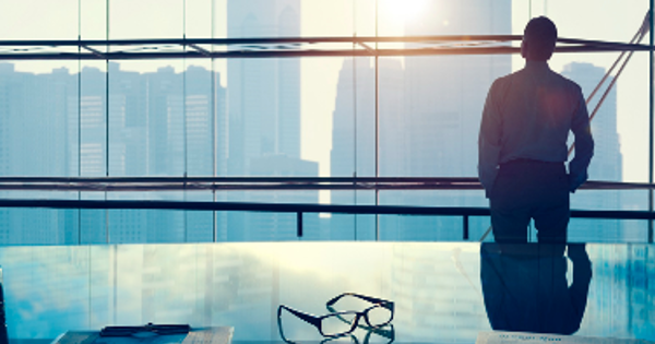 Businessman in a big office