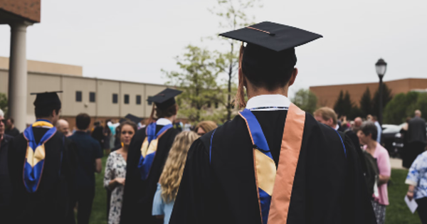 man wearing academic gown