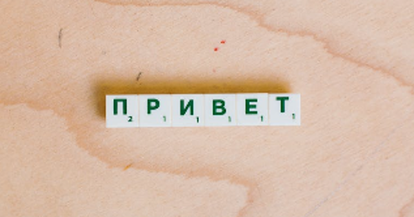 Photo Of Alphabet Tiles On Wooden Surface