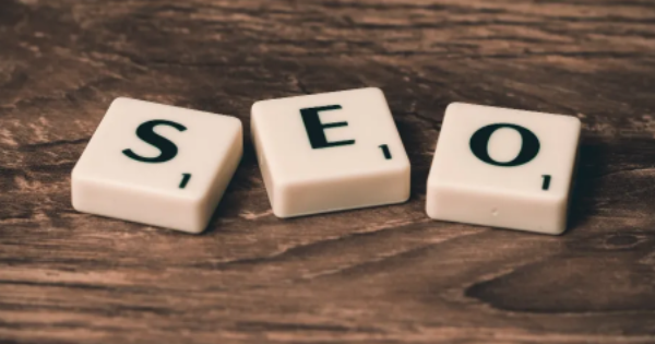 SEO Scrabble Tiles on Brown Wooden Surface