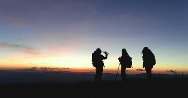 Silhouette of Three People