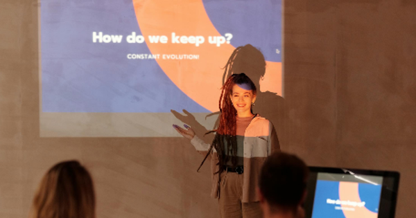 Smiling Woman Doing a Presentation